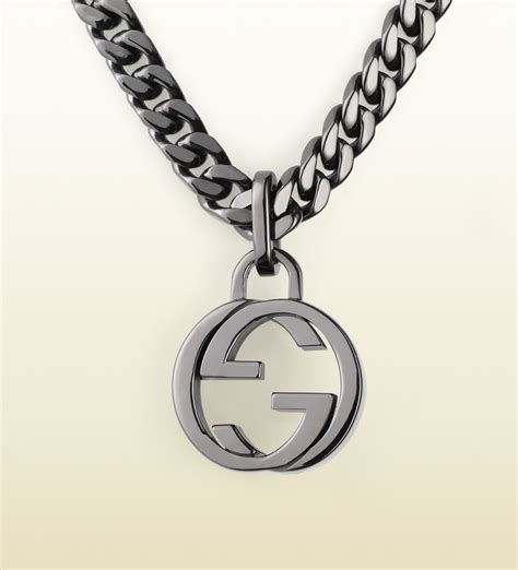 gucci interlocking sterling silver small logo necklace|Gucci necklace with heart pendant.